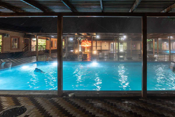 Rain storm and hot spring pool, Chunja, Kazakhstan