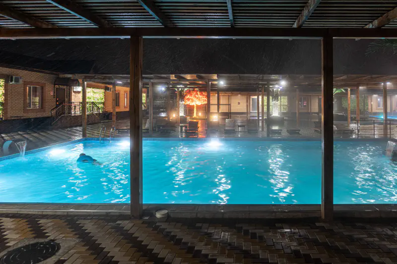 Rain storm and hot spring pool, Chunja, Kazakhstan